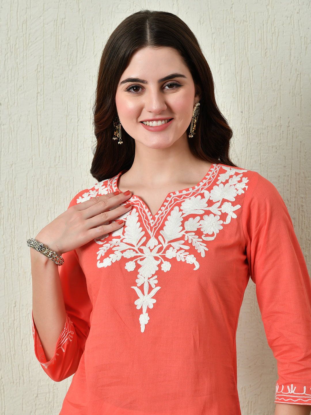 Women's Stylish Peach Cotton Short Kurti with Elegant Work - Taantav