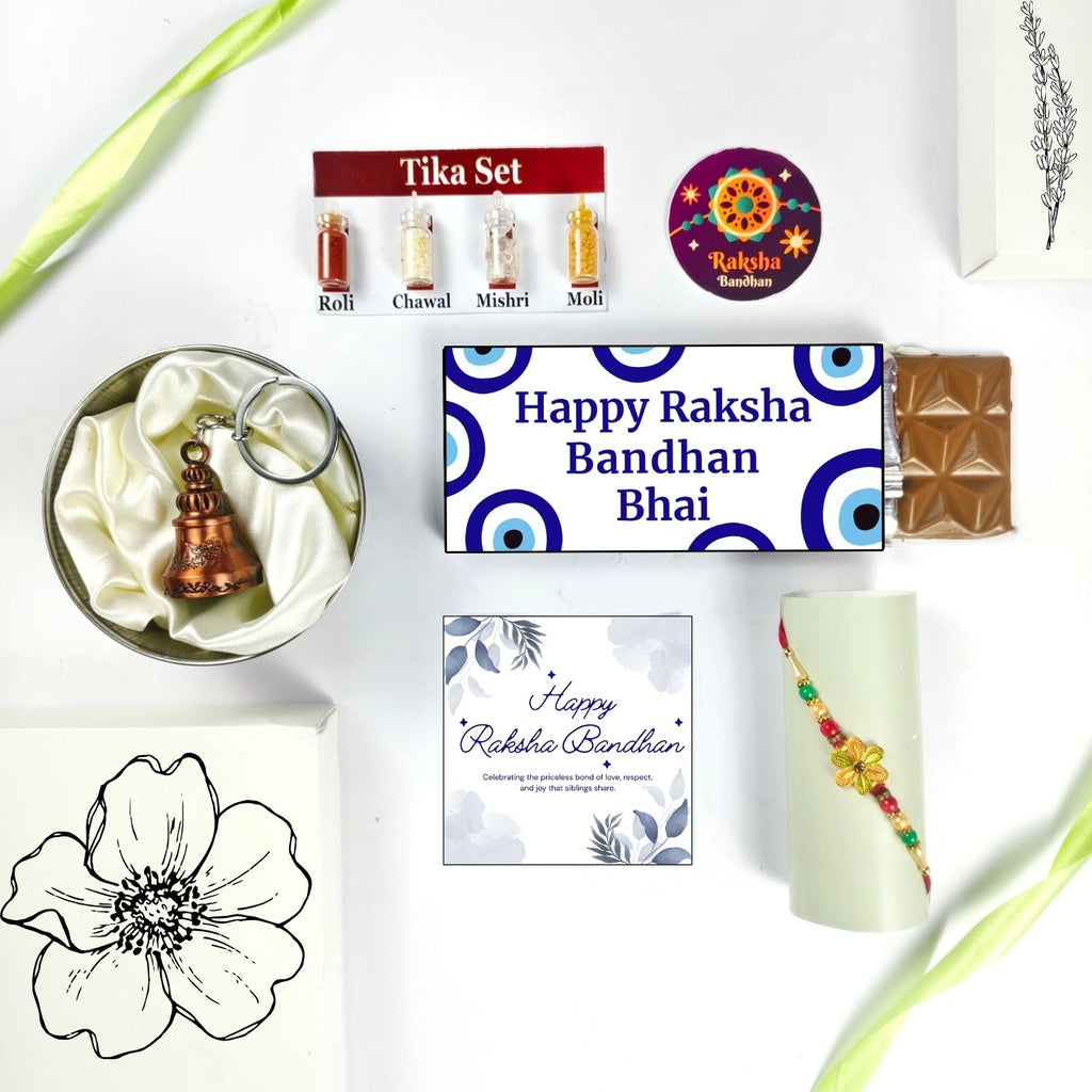 Best Rakshabandhan Chocolate Hamper For Bhai With Rakhi, Tika Set, Guardian Bell, Greeting Card And Evil Eye Theme 35G Chocolate Bar |Rakhi Theme Hamper For Bhai