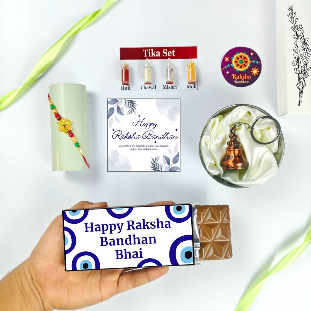 Best Rakshabandhan Chocolate Hamper For Bhai With Rakhi, Tika Set, Guardian Bell, Greeting Card And Evil Eye Theme 35G Chocolate Bar |Rakhi Theme Hamper For Bhai