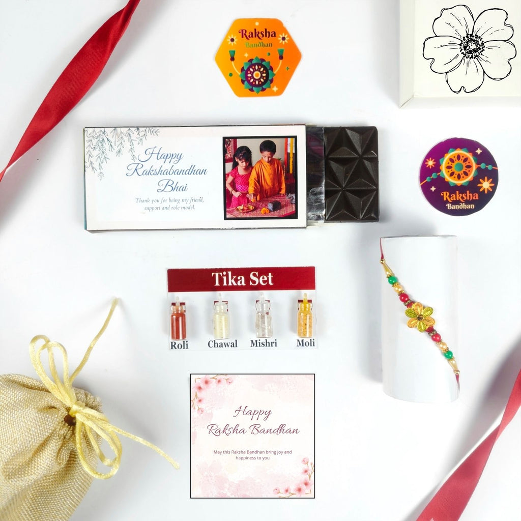 Personalized Rakhi Hamper For Brother, Rakhi Chocolate Gift For Bhai With 35G Chocolate Bar, Rakhi, Tika Set, Greeting Card And Potli | Unique Raksha Bandhan Gift