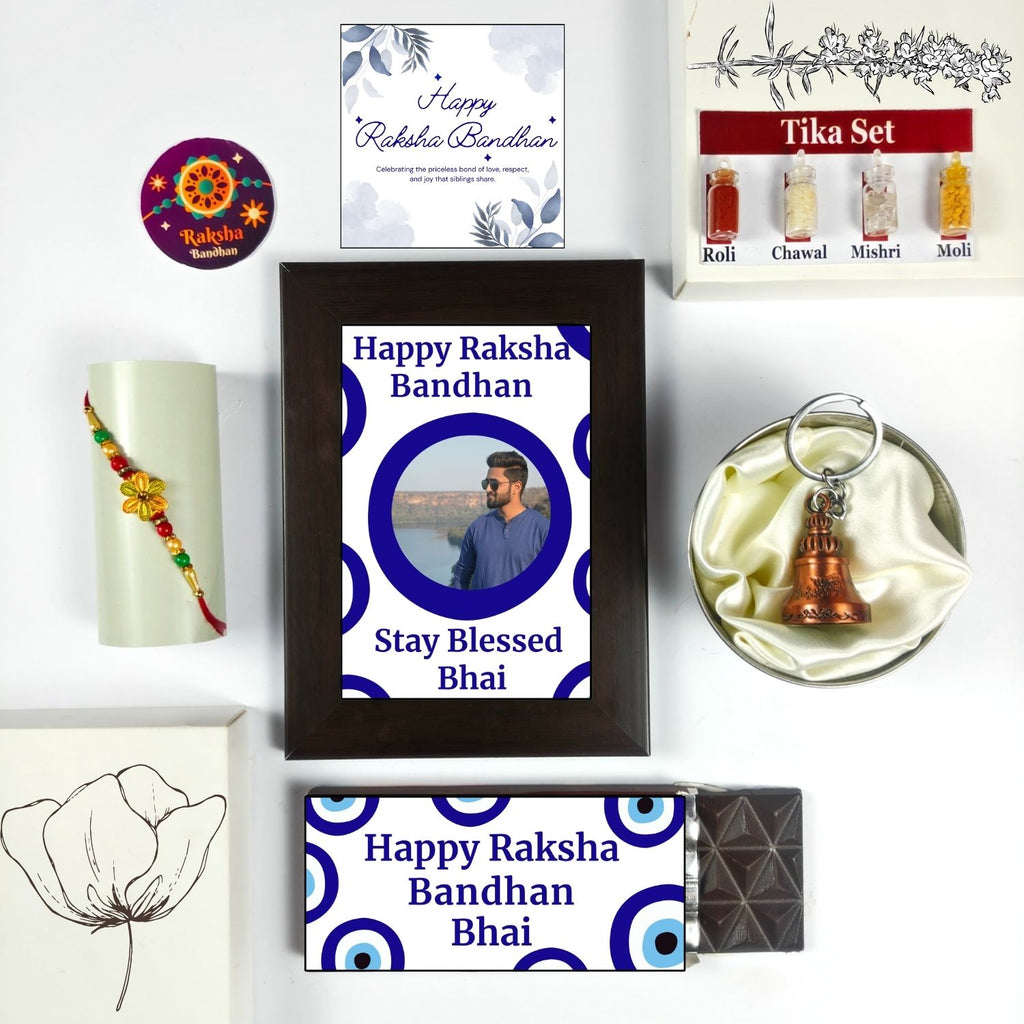 Unique Personalized Rakhi Combo For Brother, Rakshabandhan Gift For Brother With Evil Eye Theme 35G Chocolate Bar, Customized Photo Frame, Rakhi, Tika Set, Greeting Card And Guardian Bell | Unique Rakhi Gift