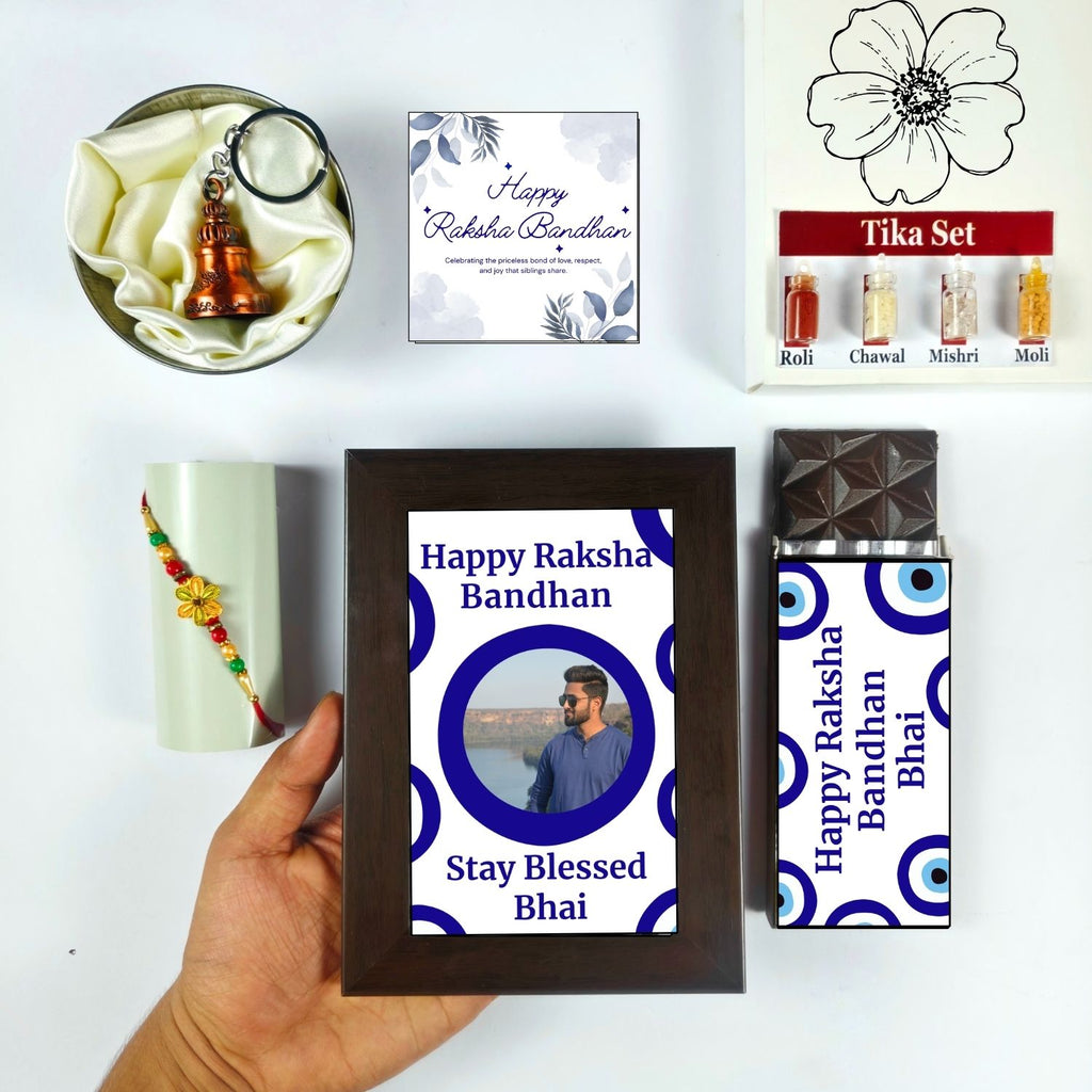 Unique Personalized Rakhi Combo For Brother, Rakshabandhan Gift For Brother With Evil Eye Theme 35G Chocolate Bar, Customized Photo Frame, Rakhi, Tika Set, Greeting Card And Guardian Bell | Unique Rakhi Gift