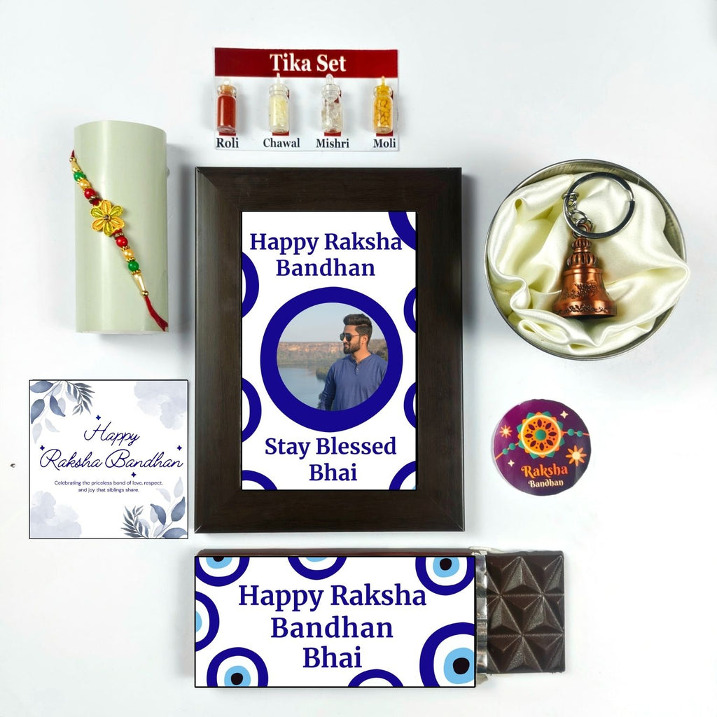 Unique Personalized Rakhi Combo For Brother, Rakshabandhan Gift For Brother With Evil Eye Theme 35G Chocolate Bar, Customized Photo Frame, Rakhi, Tika Set, Greeting Card And Guardian Bell | Unique Rakhi Gift
