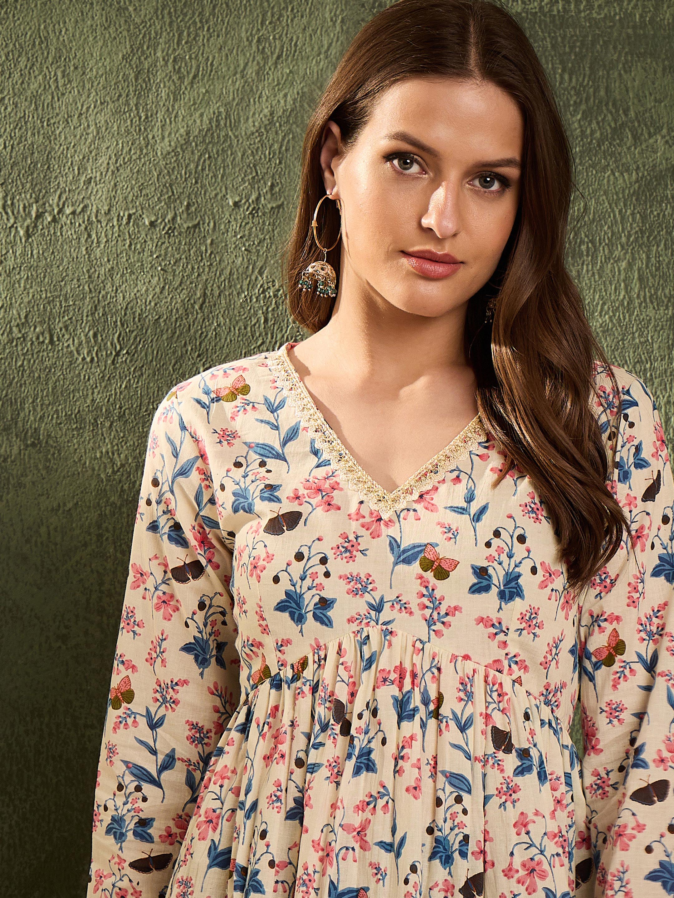 Women's Off White Floral V Neck Full Sleeves Peplum Kurti