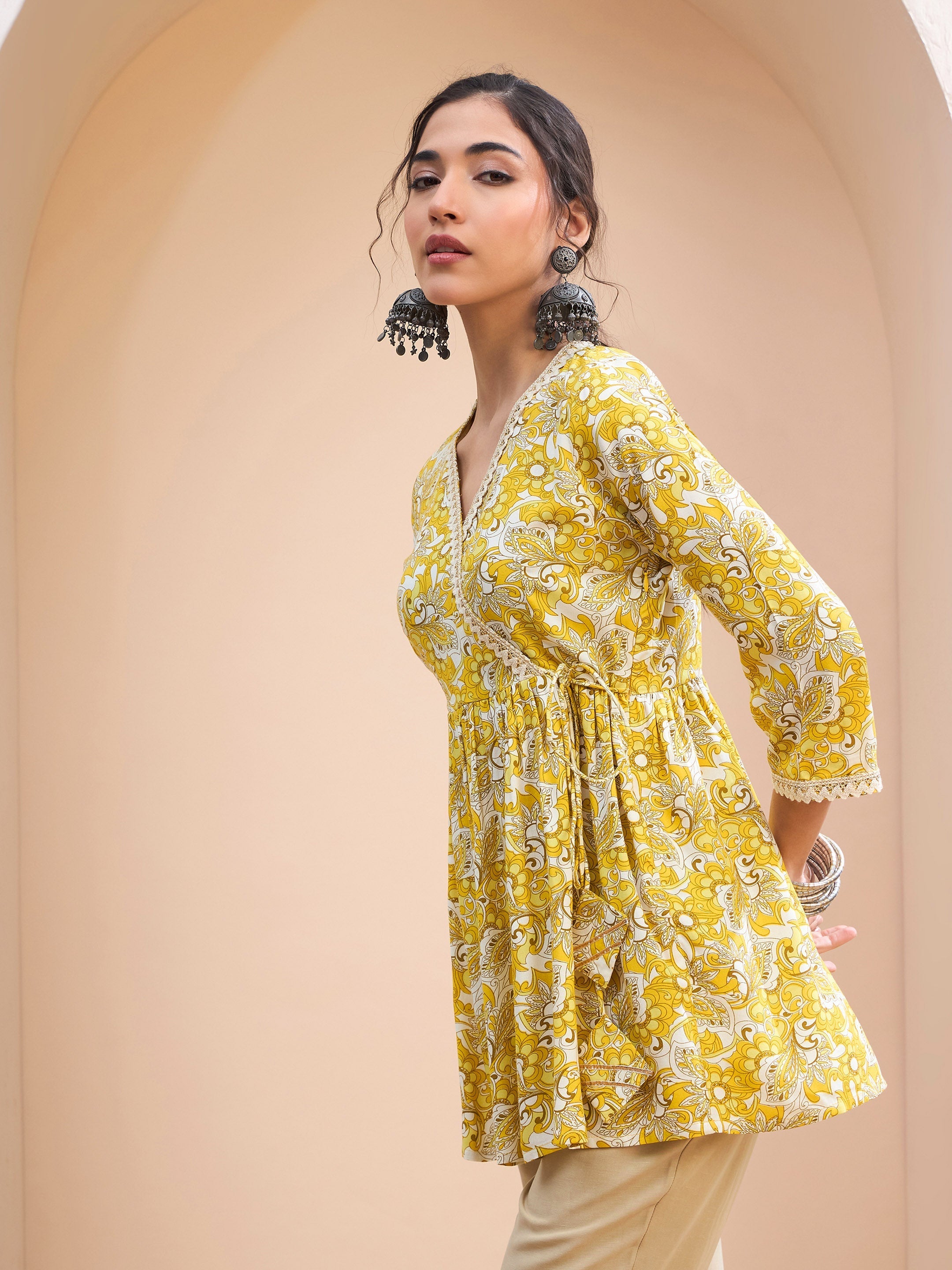 Women's Yellow Floral Wrap Neck Peplum Kurti-SHAE