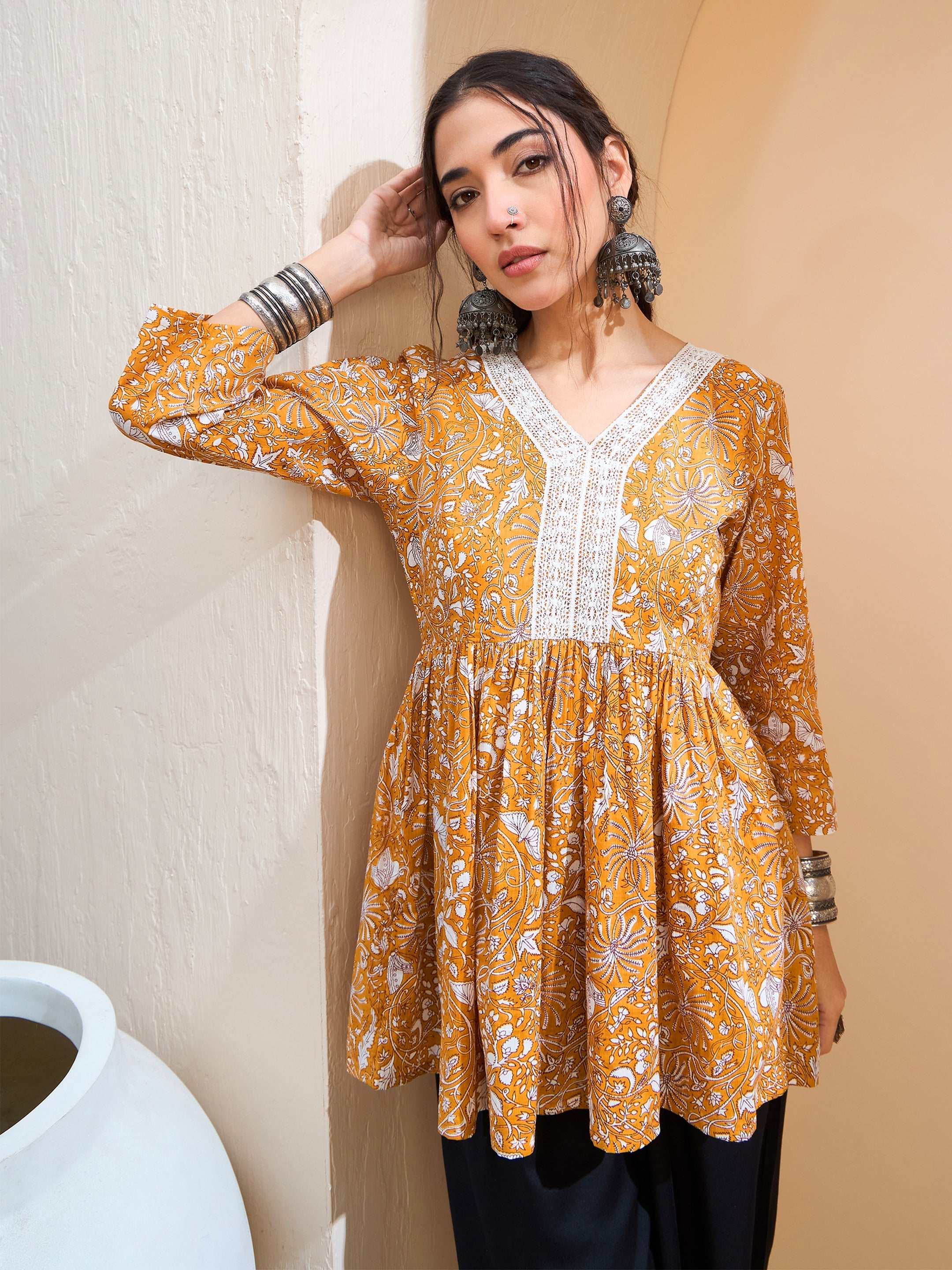 Women's Yellow Floral Cambric V Neck Peplum Kurti-SHAE