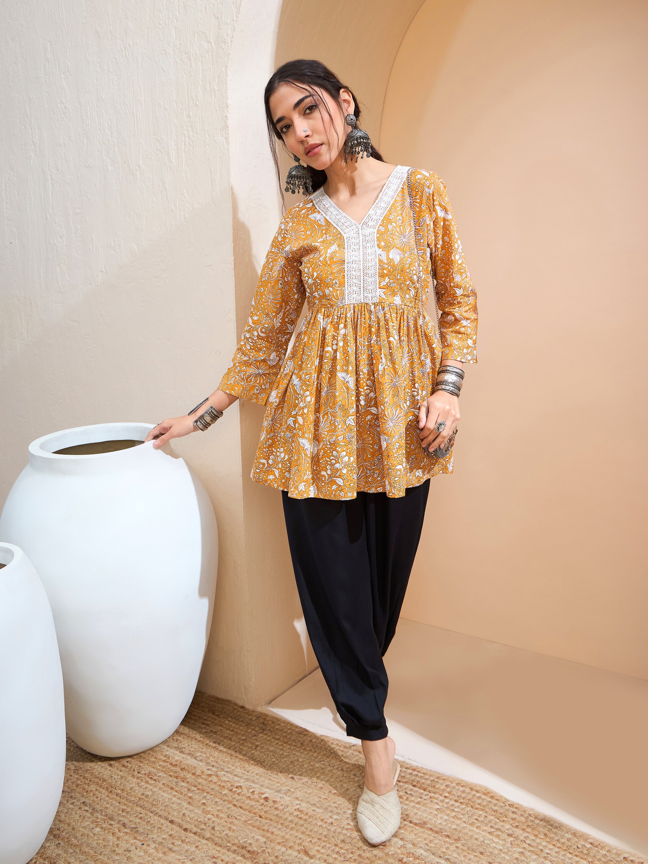 Women's Yellow Floral Cambric V Neck Peplum Kurti-SHAE