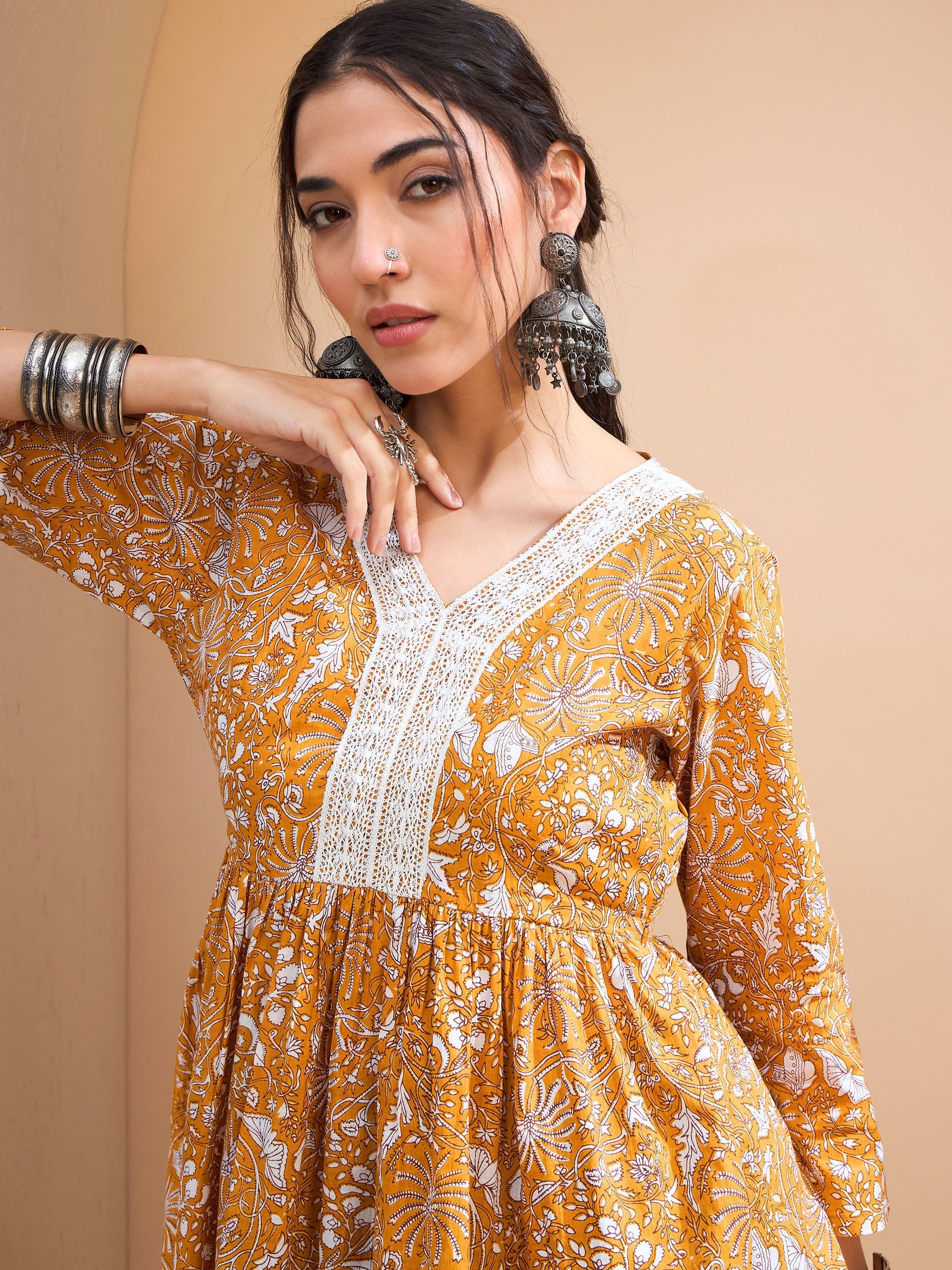 Women's Yellow Floral Cambric V Neck Peplum Kurti-SHAE