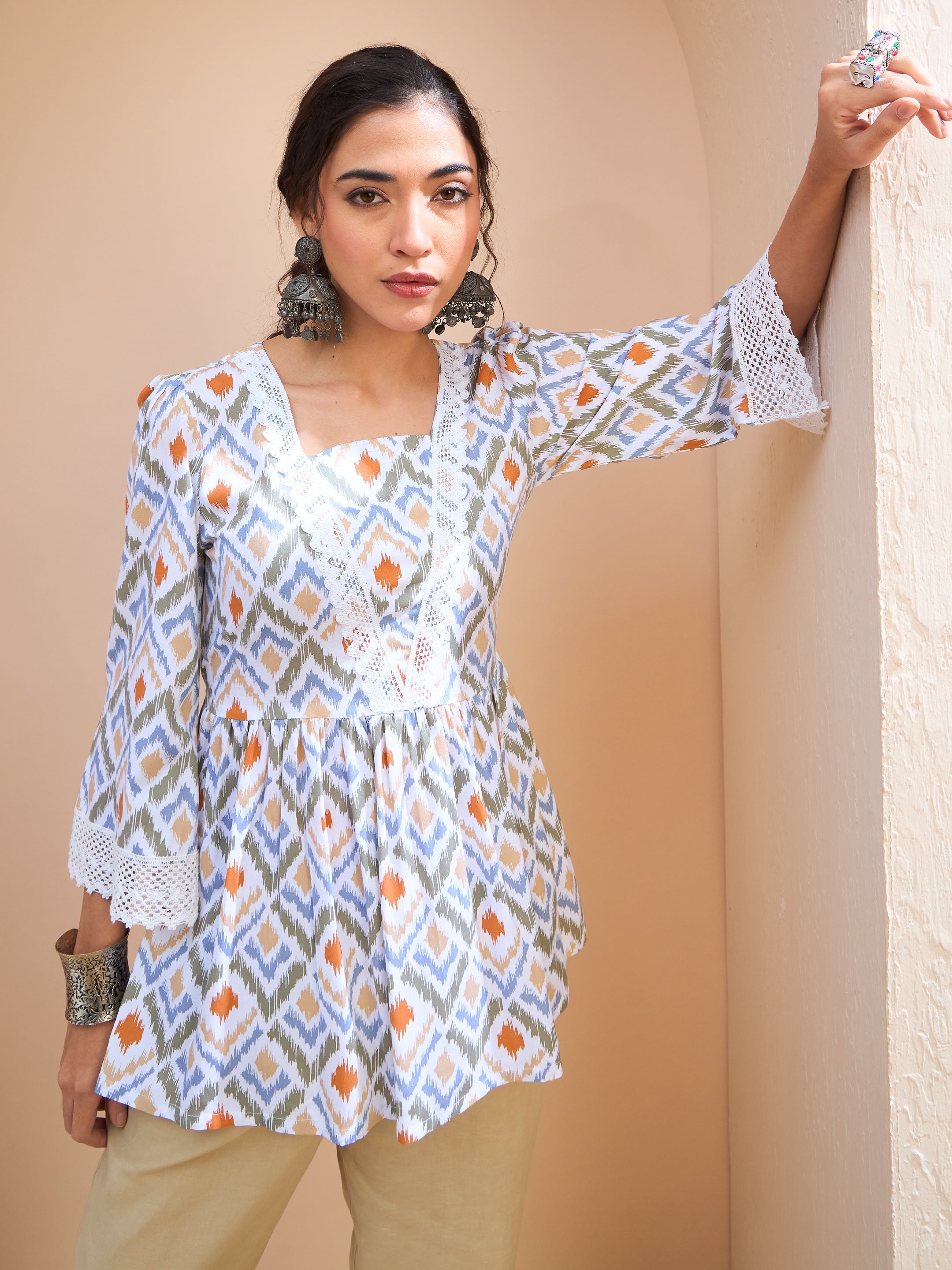 Women's White Geometric Print Peplum Kurti-SHAE