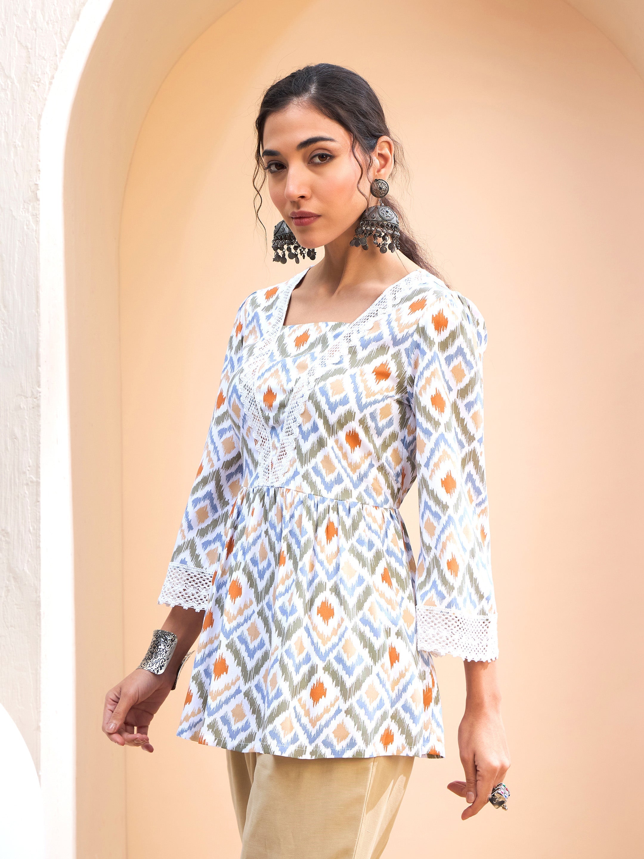 Women's White Geometric Print Peplum Kurti-SHAE