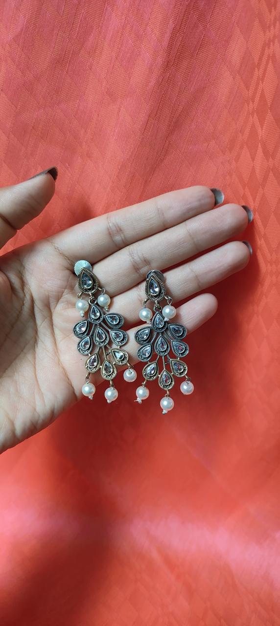 Dual tone peacock feather earrings for women