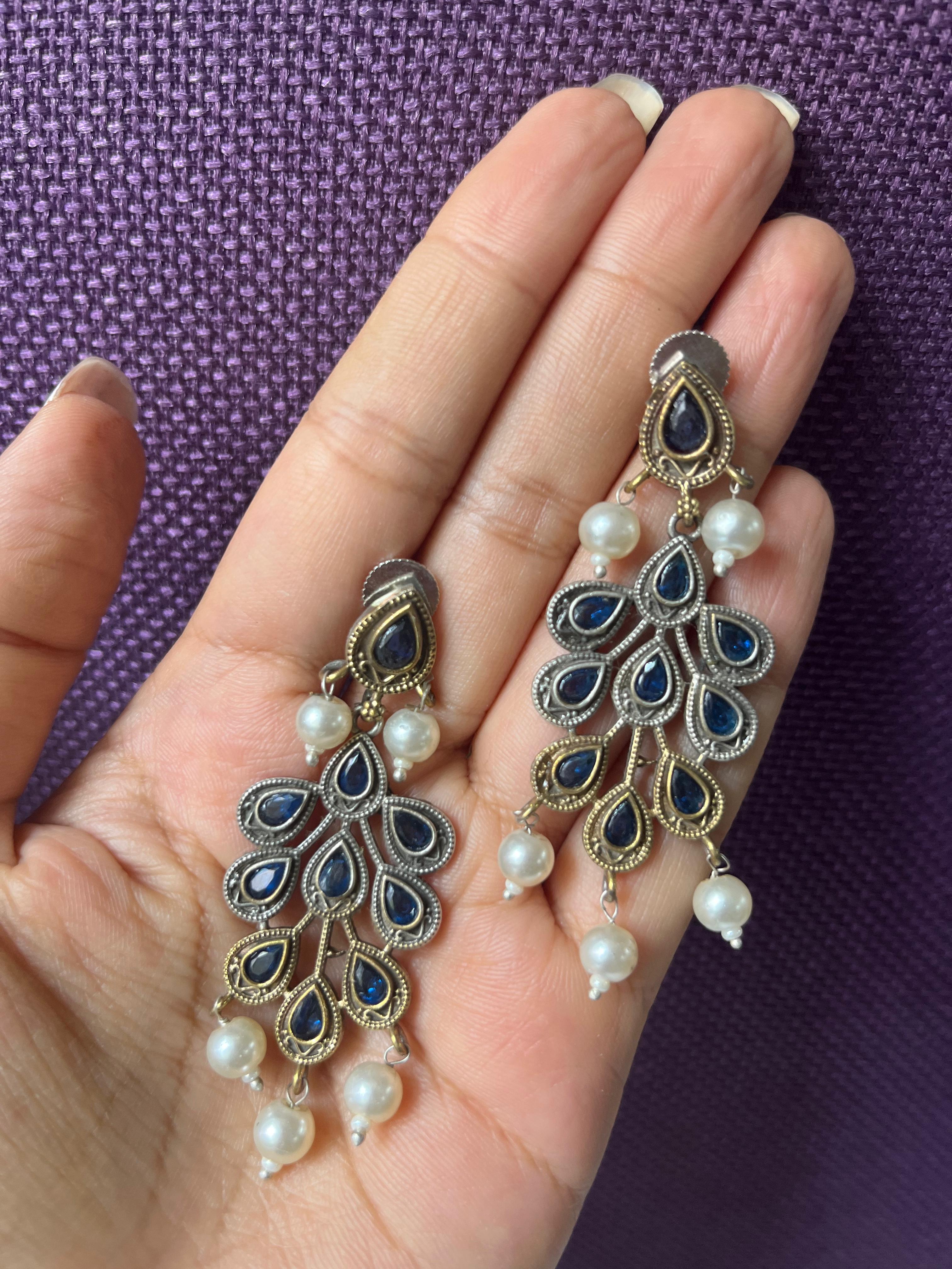 Dual tone blue stone peacock feather earrings for women