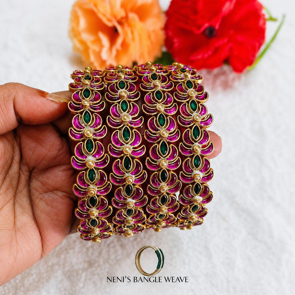Women's Pink And Golden Floral Kundan Bangle Set With Ruby and Emerald Stones