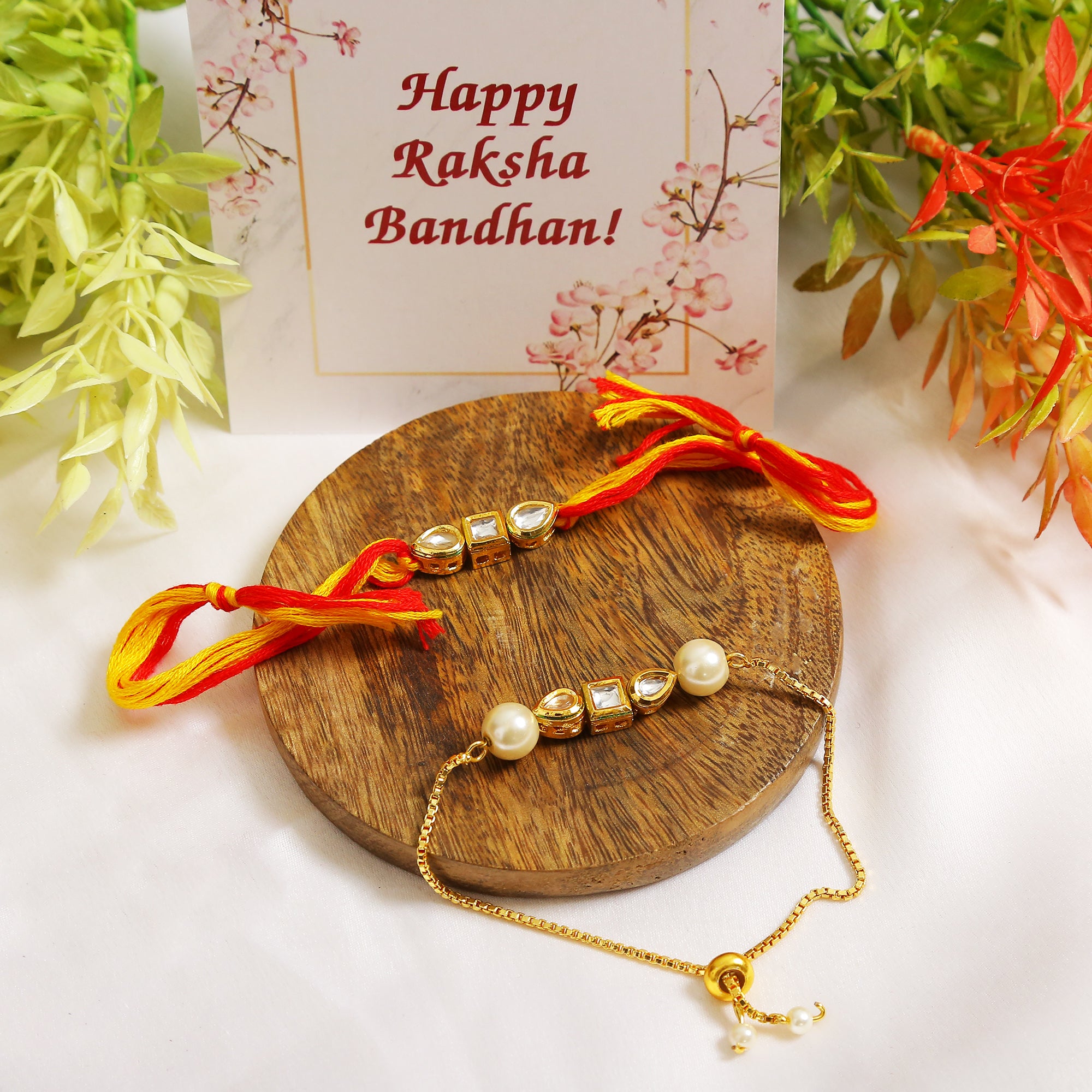 Set Of 2 - Gold-Toned Kundan Embellished Rakhi & Lumba Set