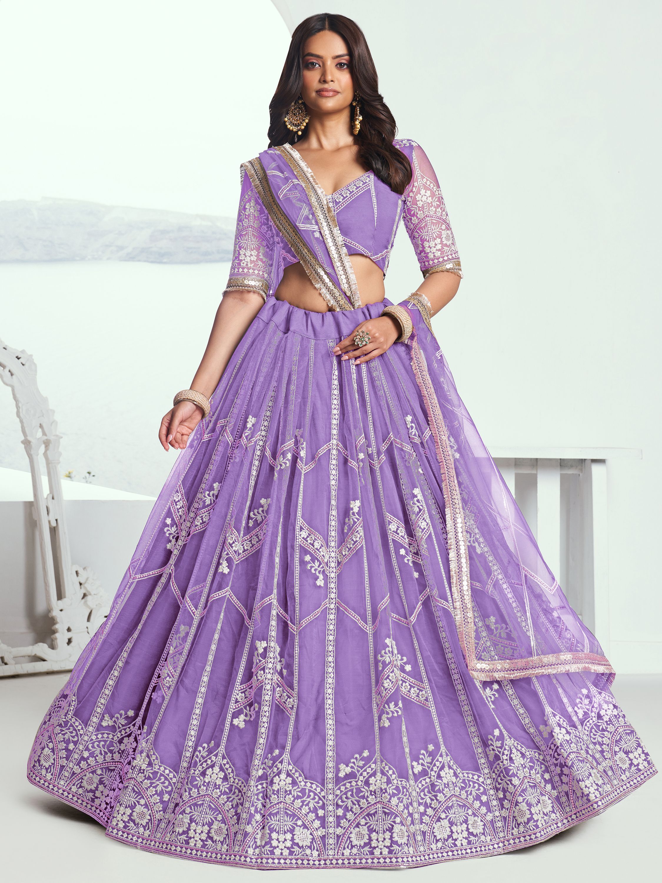Women's Alluring Lavender Thread Work Net Engagement Wear Lehenga Choli | Trendia Global Women's Alluring Lavender Thread Work Net Engagement Wear Lehenga Choli | Trendia Global