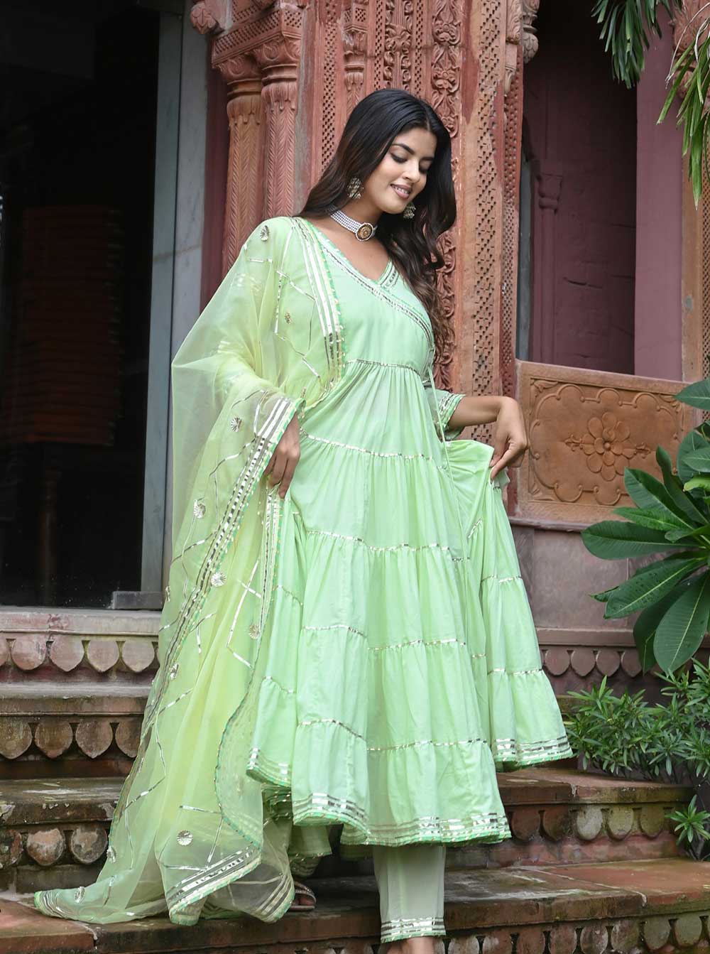 pista green anarkali dress Pistachio Green Roman Silk Four-Layer Anarkali Gown Set