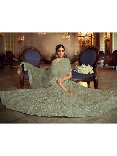 Women's  Green Soft Net Heavy Embroidered Lehenga - Myracouture