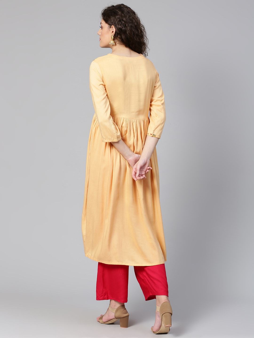 Women's Peach-Coloured Yoke Design A-Line Kurta - Meeranshi