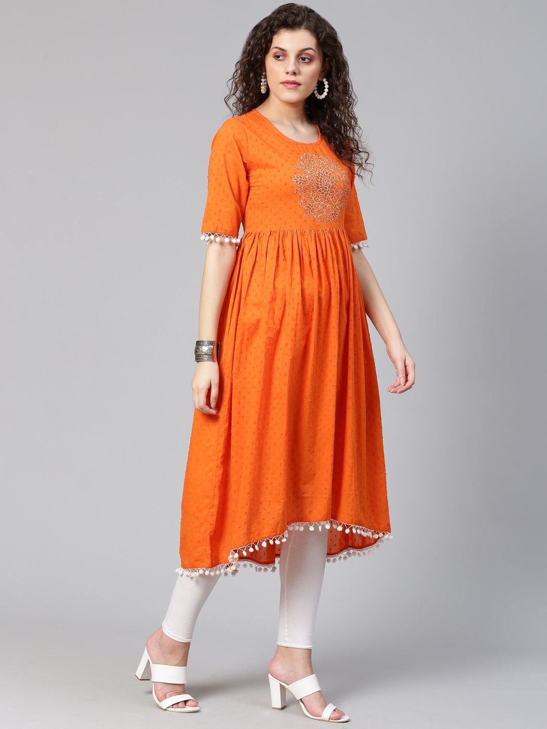 Women's Orange Pom-Pom Detail Woven Design High-Low A-Line Kurta - Meeranshi