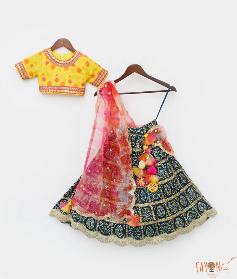 Girl's Yellow Brocade Choli Lehenga And Pink Organza Dupatta