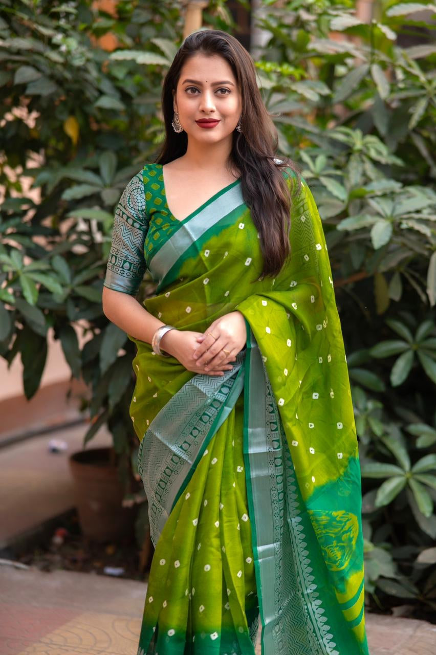 Women's Soft jute silk saree with allover bandhani print and cut broasso border