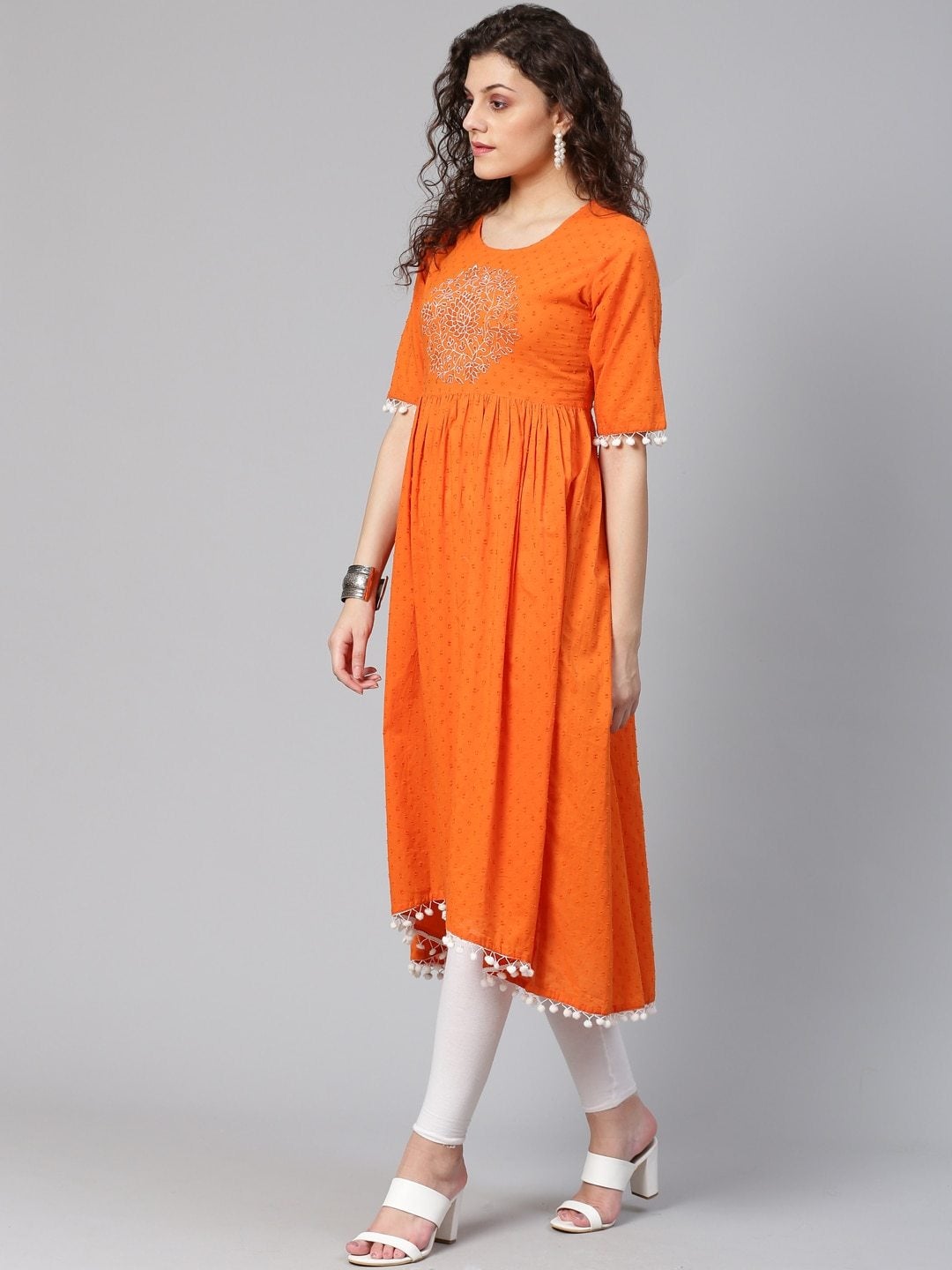 Women's Orange Pom-Pom Detail Woven Design High-Low A-Line Kurta - Meeranshi
