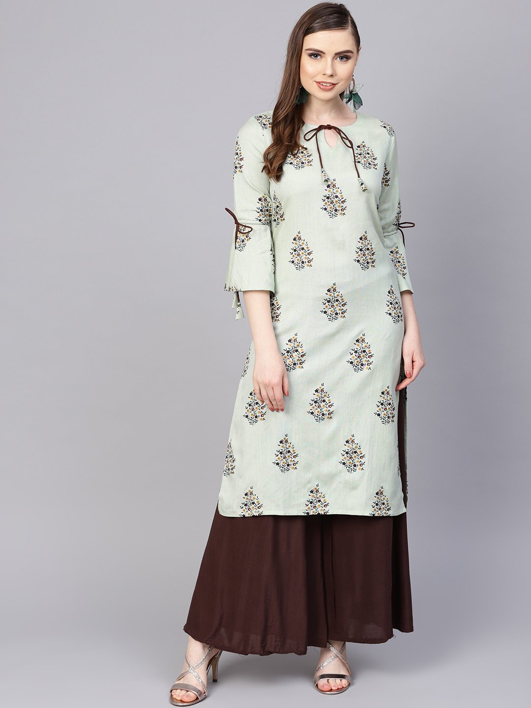 Women's Pista Green Floral Printed Kurta With A Front Keyhole And Flared Sleeves - Nayo Clothing