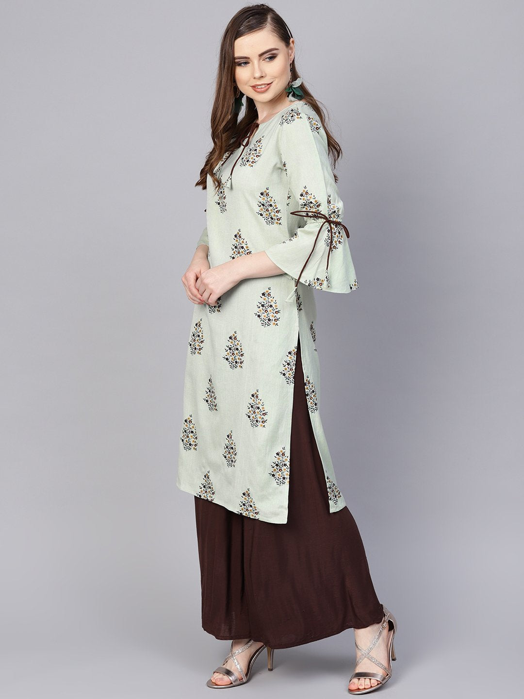 Women's Pista Green Floral Printed Kurta With A Front Keyhole And Flared Sleeves - Nayo Clothing