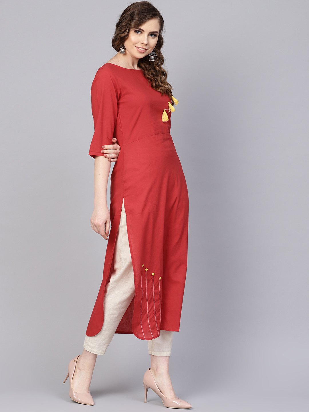 Women's Solid Red Kurta With Thread Stitch And Tassels Detailing With A Round Neck And 3/4Th Sleeves - Nayo Clothing