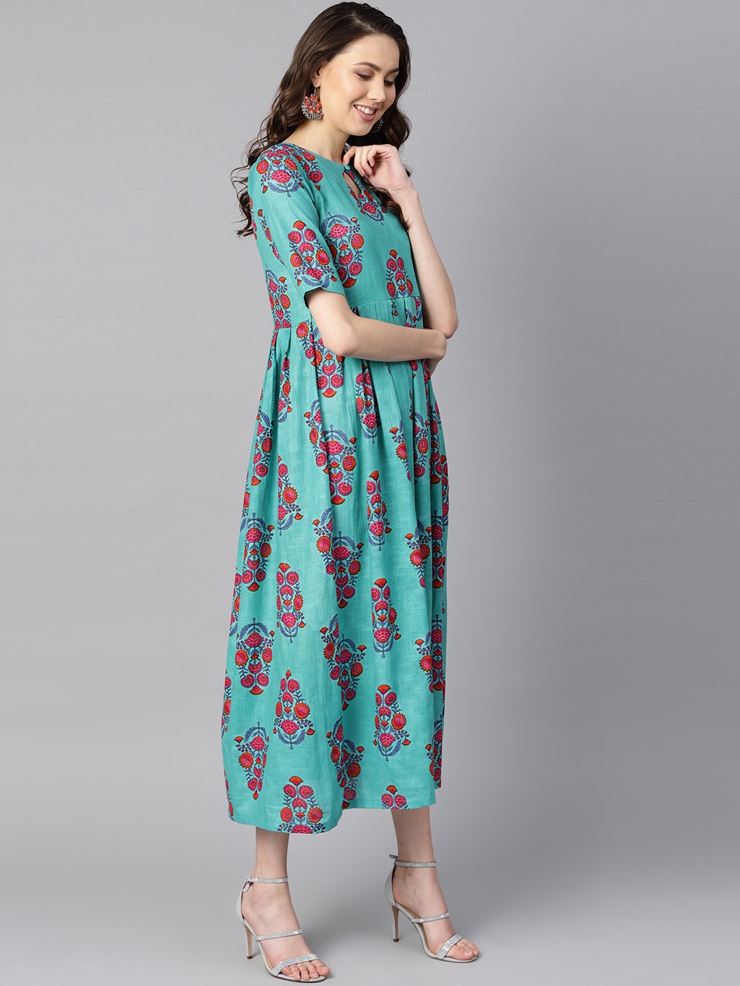Women's Turqish Blue Color Printed Half Sleeve Pleated Maxi Dress With Deep Back And Tassel Detailing. - Nayo Clothing