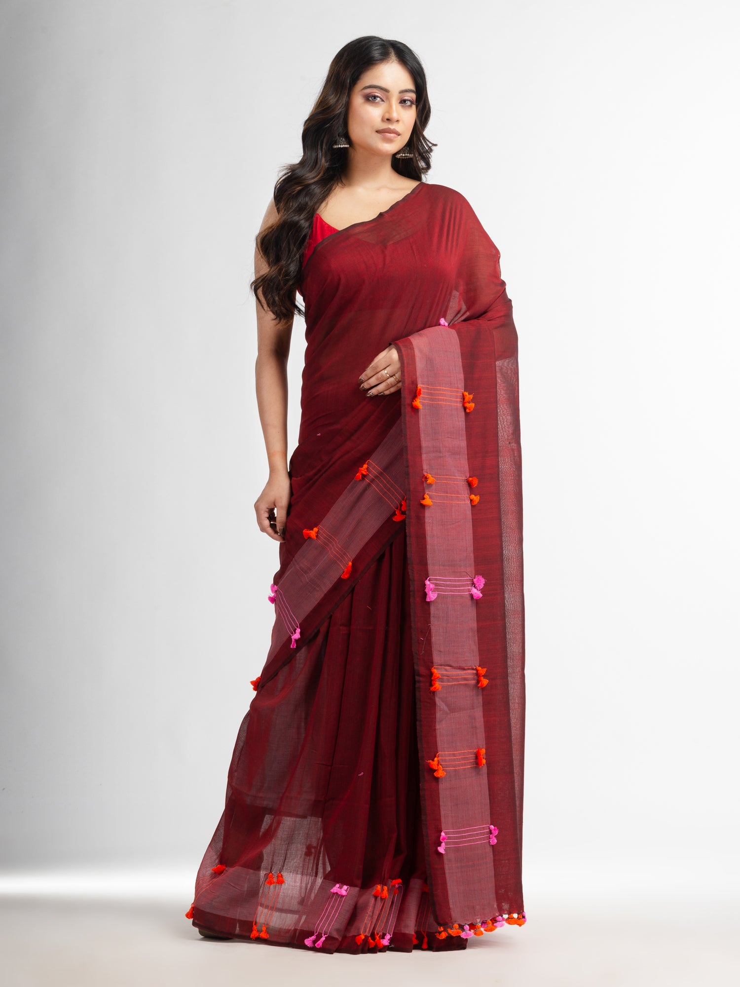Women's Meroon cotton saree with multi colour thread weave and tassels - Angoshobha
