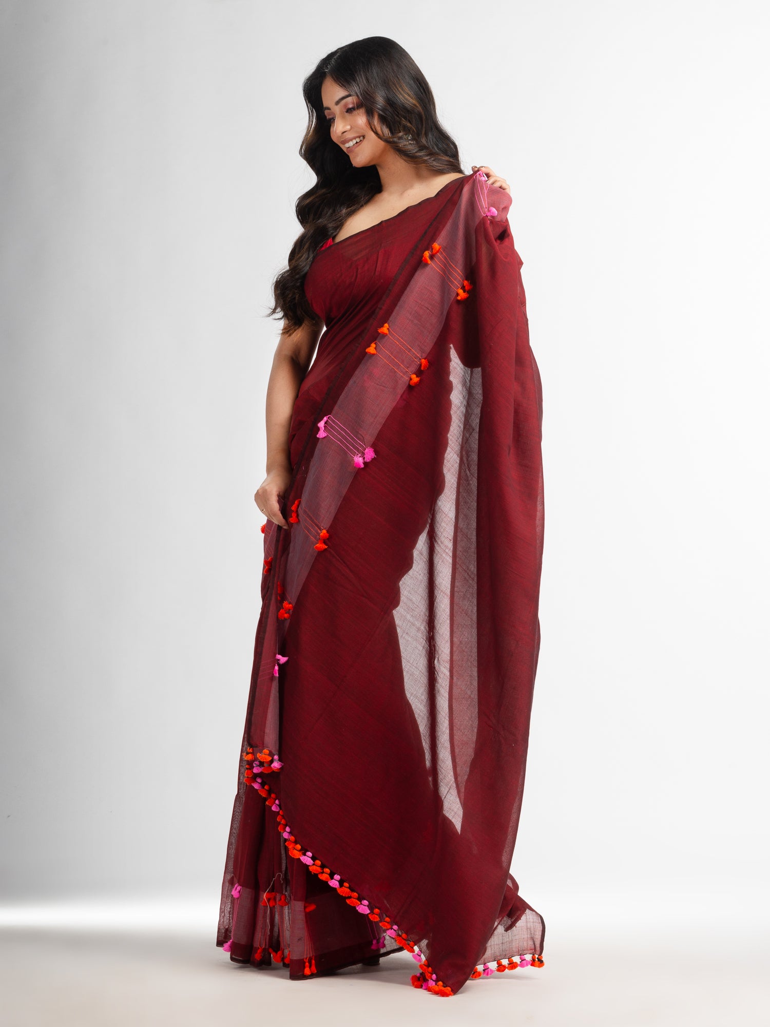Women's Meroon cotton saree with multi colour thread weave and tassels - Angoshobha