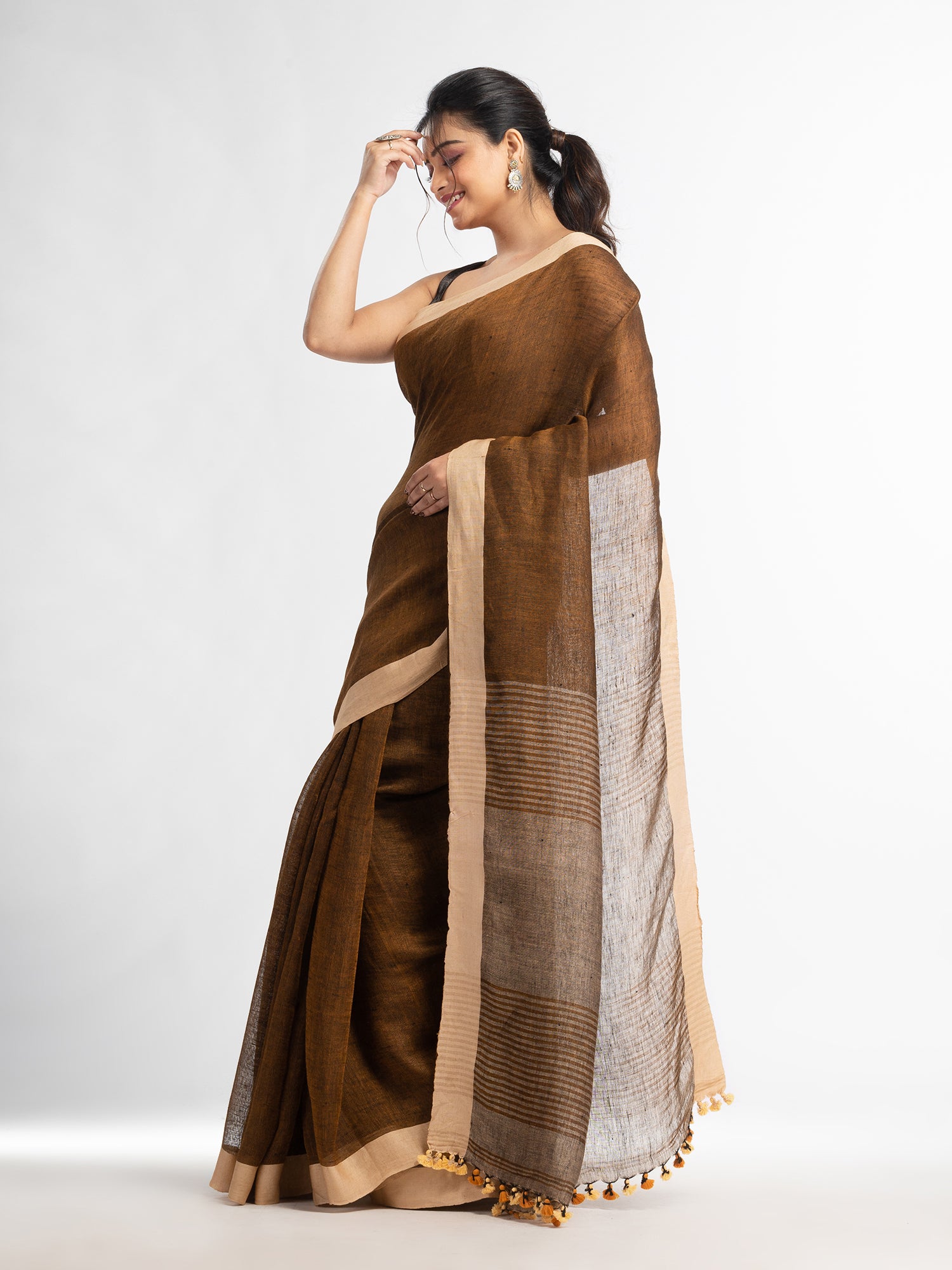 Women's Brown with multi colour pallu in solit boeder handwoven linen saree - Angoshobha
