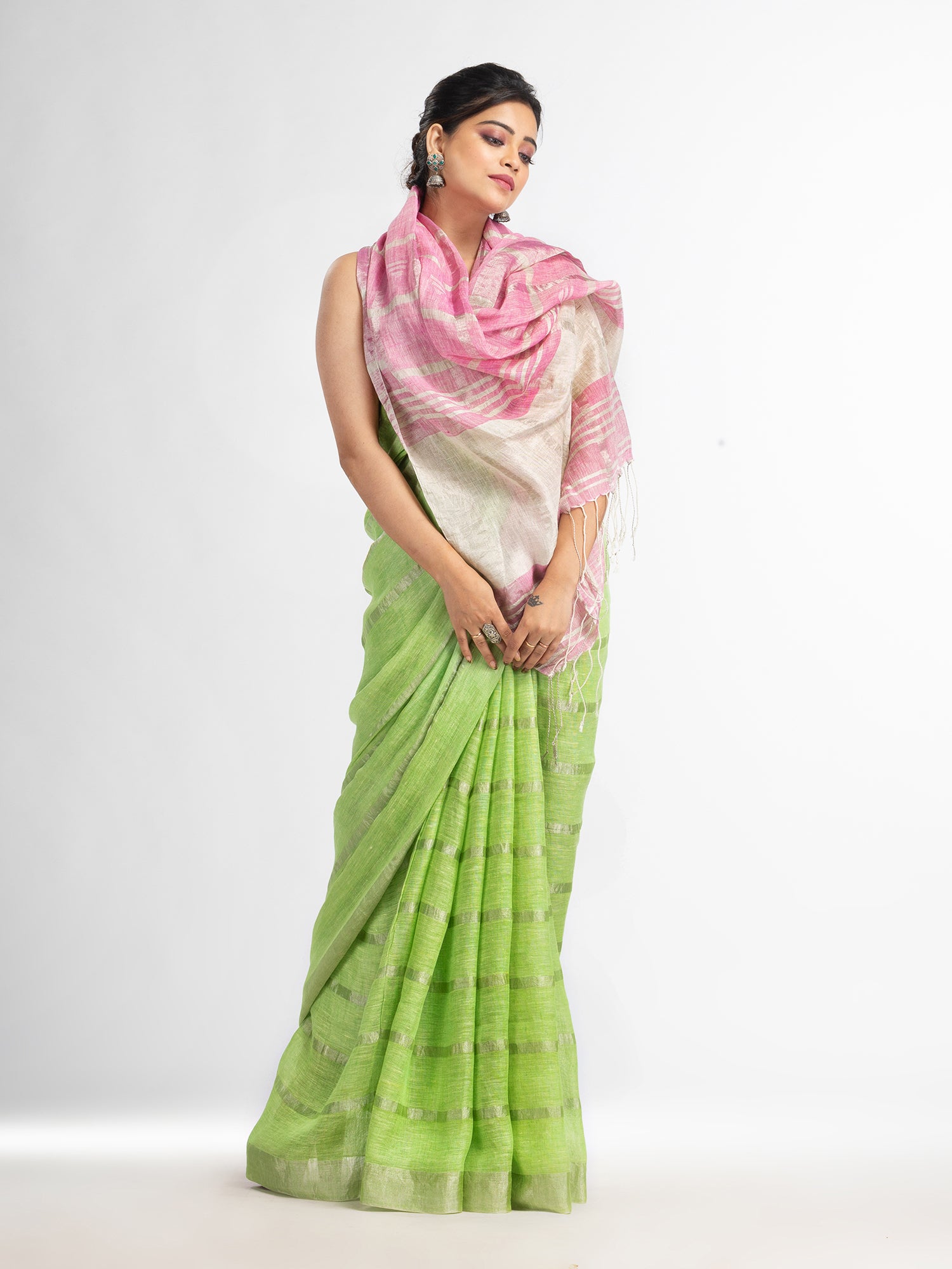 Women's green pink half and half ziri check with silver zari pallu in zari border handwoven linen saree - Angoshobha