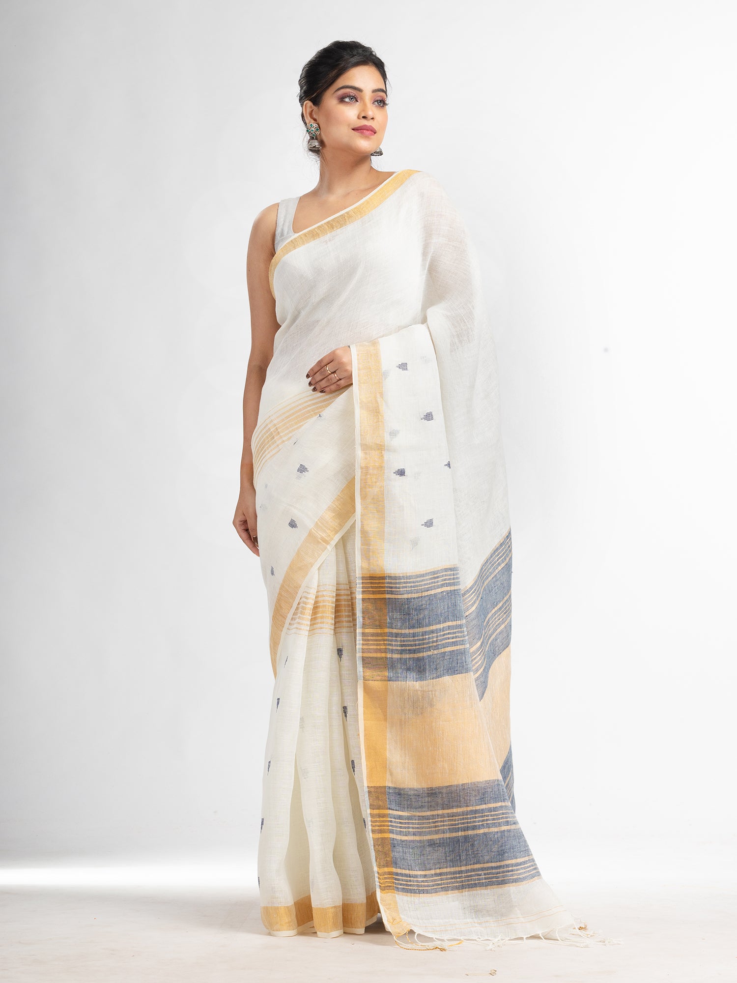 Women's white half body buti with gold zari and nevy blue pallu in gold zari border handwoven linen saree - Angoshobha