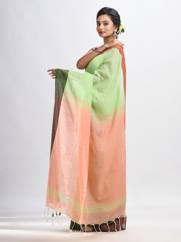 Women's Light green cotton with solid body in tawny peach pallu handloom saree