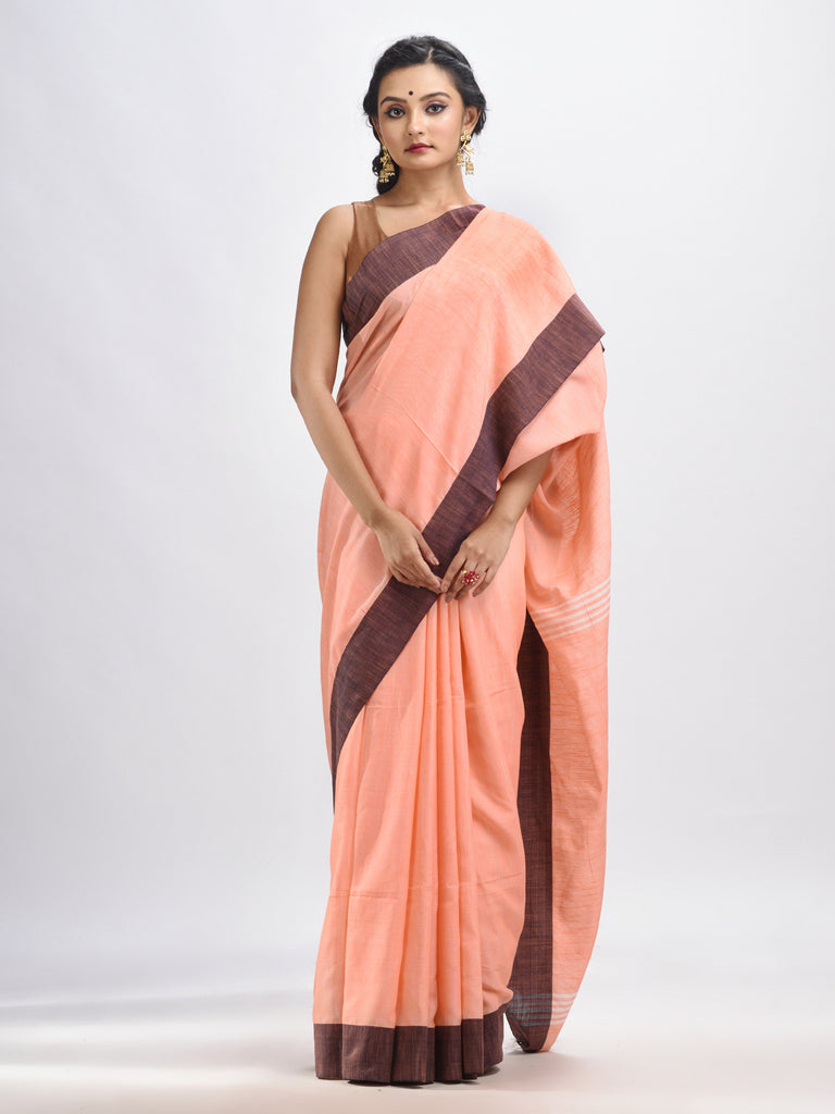 Women's Peach cotton solid body handloom saree