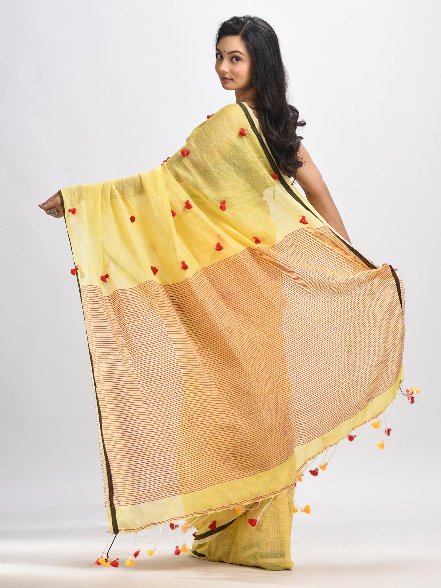 Women's Yellow linen all body pom pom with pallu stipe handwoven saree - Angoshobha