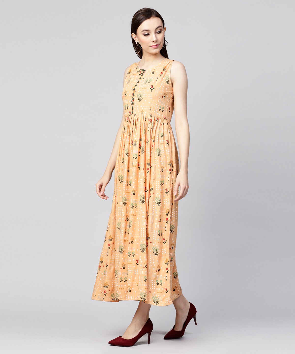 Women's Yellow Printed Sleeveless Rayon A-Line Maxi Dress With Button  In Yokr - Nayo Clothing