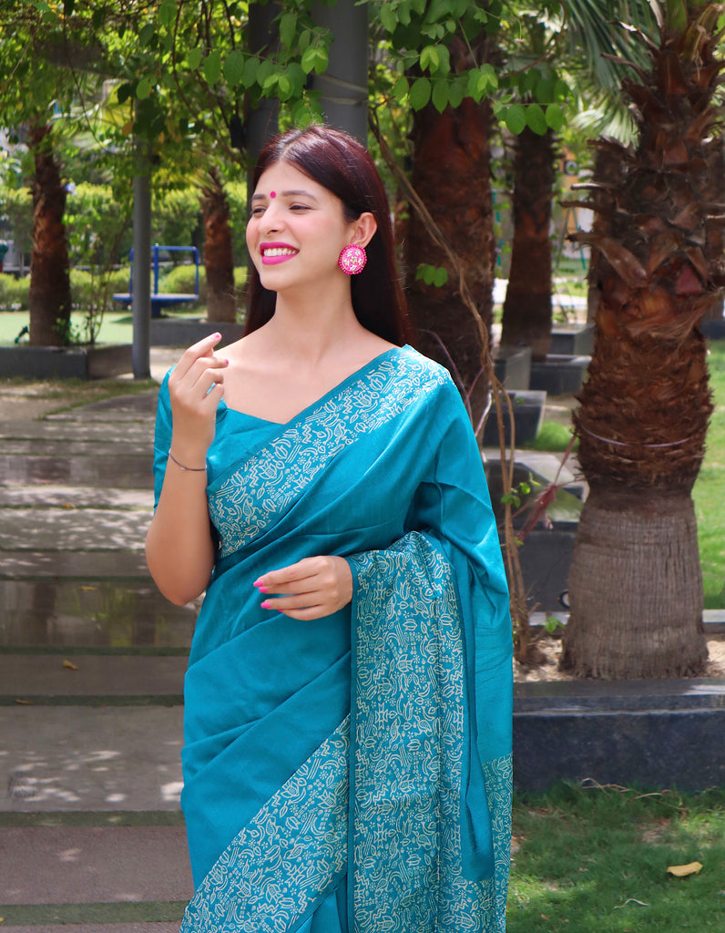 Women's Firozi Woven Handloom Raw Silk Saree With Tassels