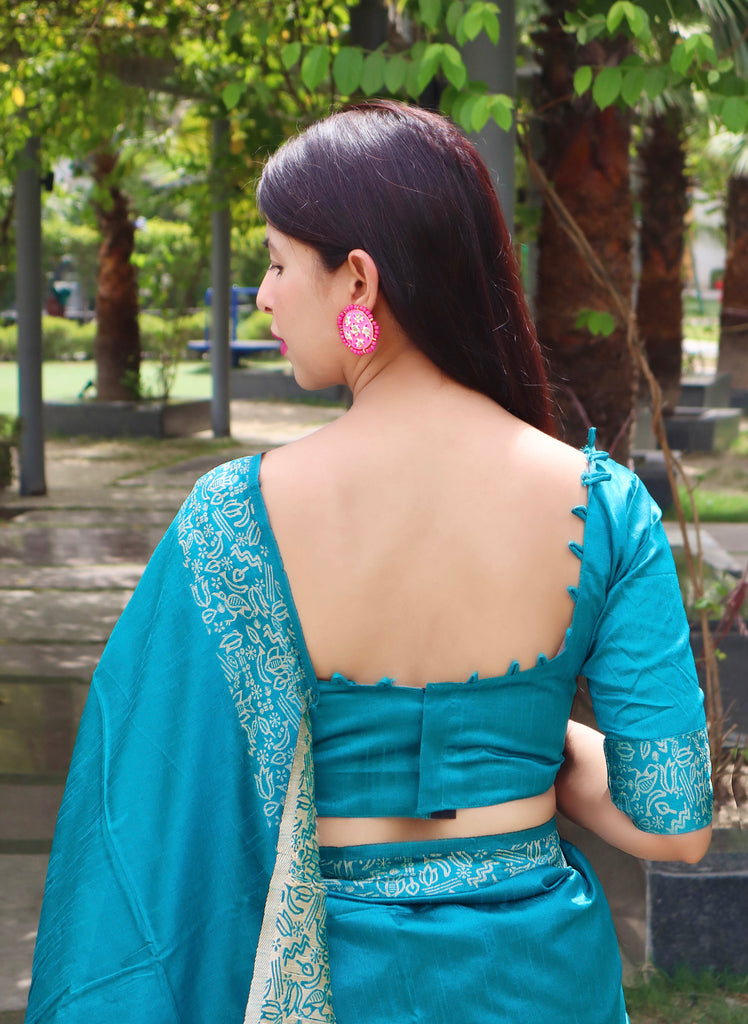 Women's Firozi Woven Handloom Raw Silk Saree With Tassels