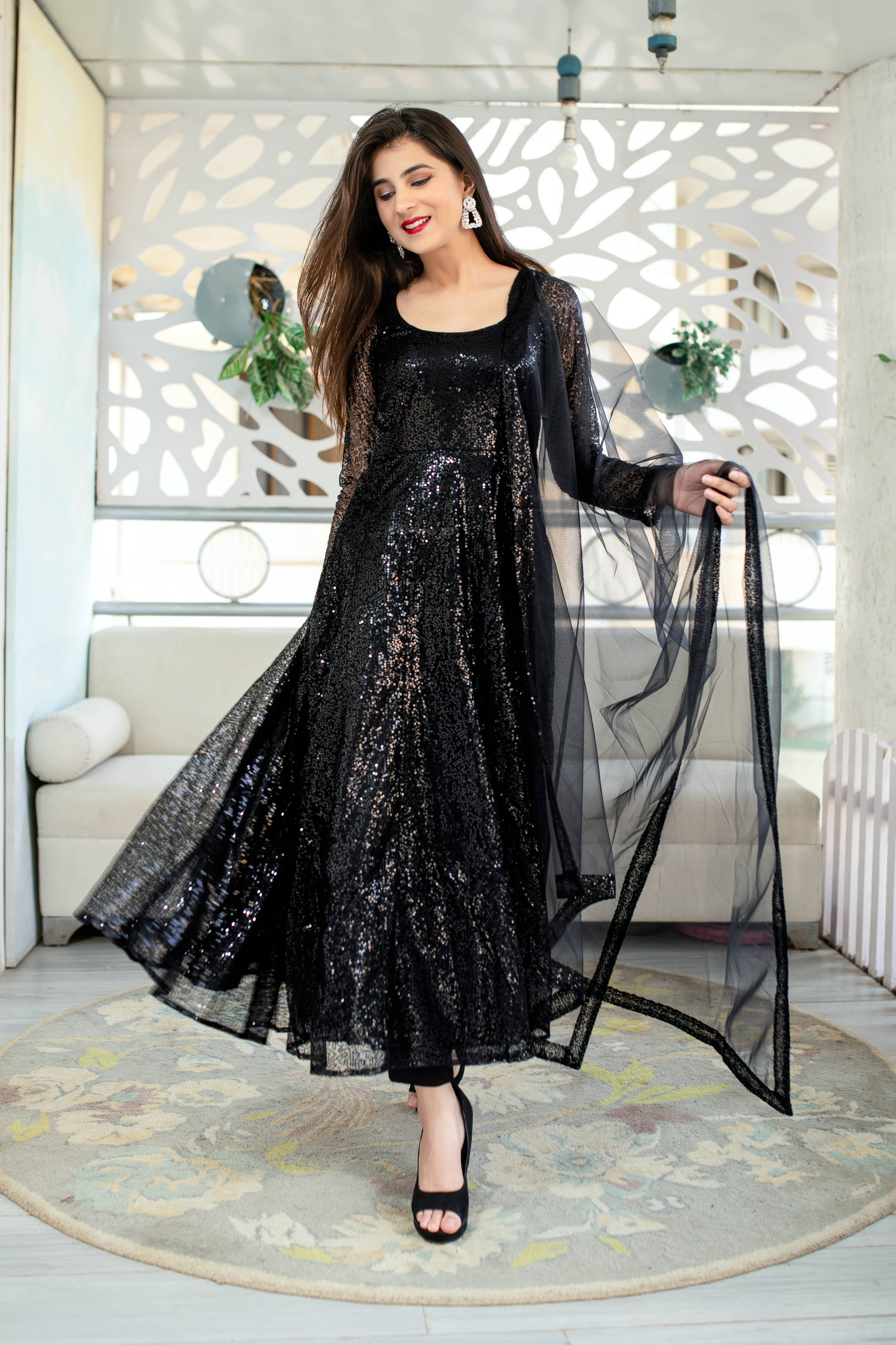 black sequin dress india When elegance knows exactly how to turn heads. A silhouette crafted to shimmer with every step, stitched for evenings that become stories. TV Actor @muskanbamne stuns in our Svara black, tasselled, sequin