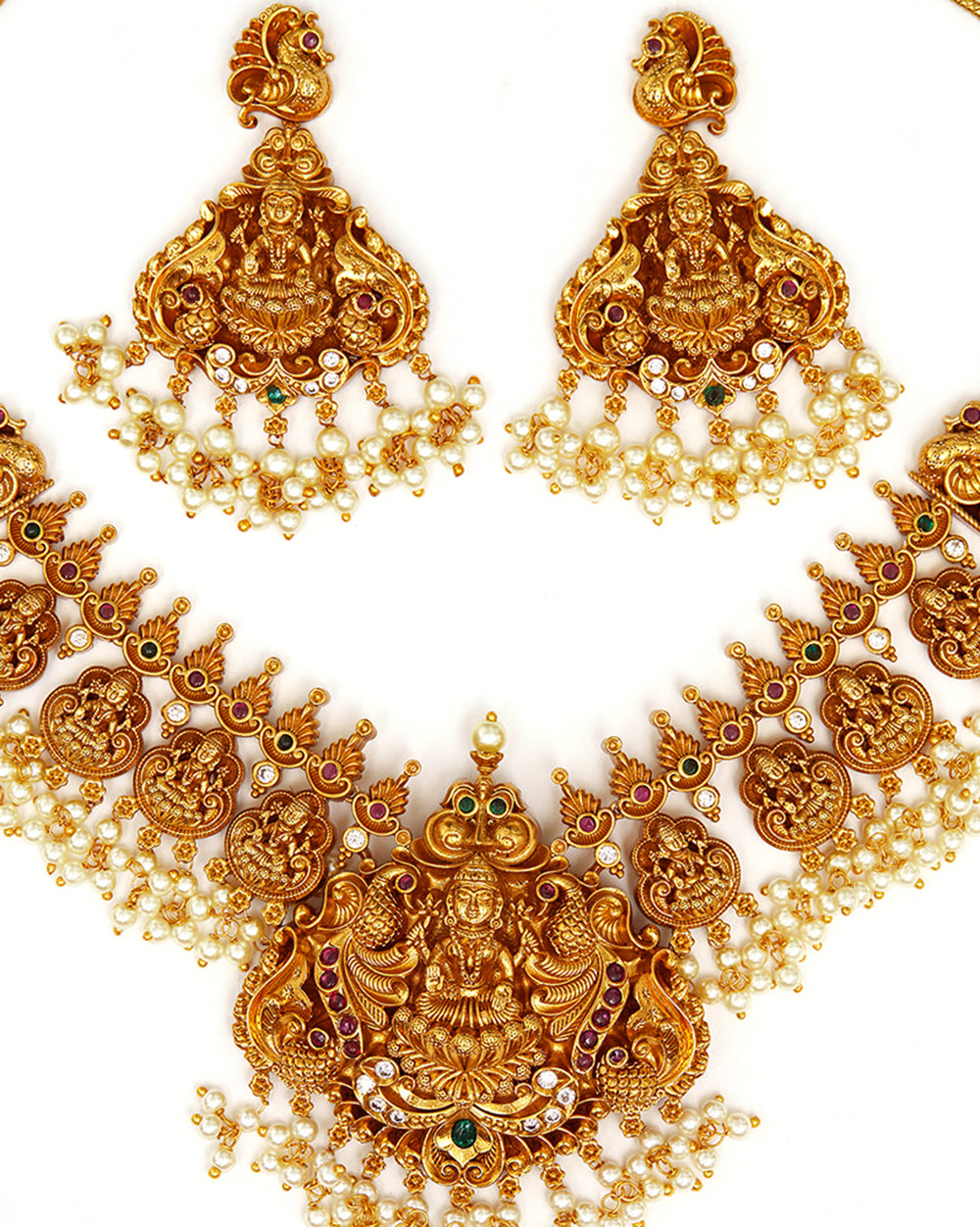 Women's Goddess Lakshmi Temple Design Brass Gold Toned Faux Pearls Adorned Jewellery Set - Voylla