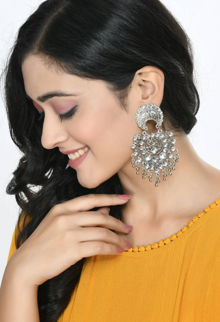 Trendia Silver color base with Kundan & Ghungru Ear