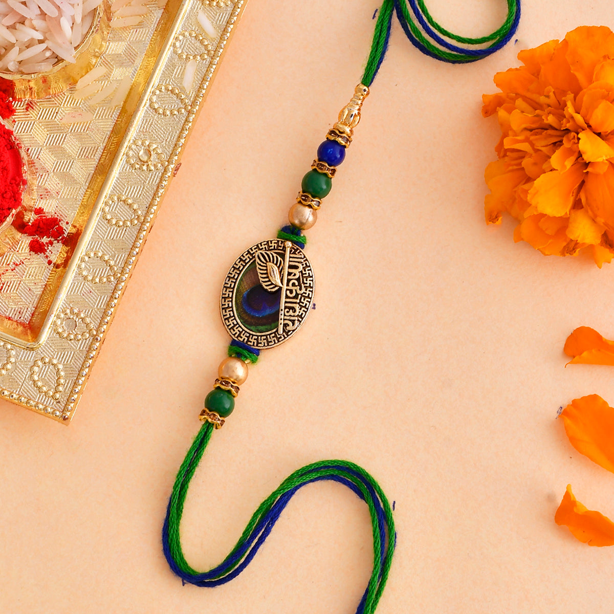 Radha Krishna Peacock Feather Beaded Thread Rakhi - Voylla