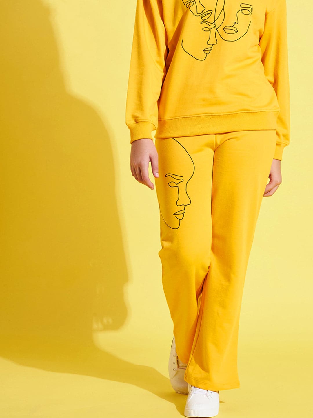 Girls Yellow Face Print Terry Track Pants - Lyush Kids