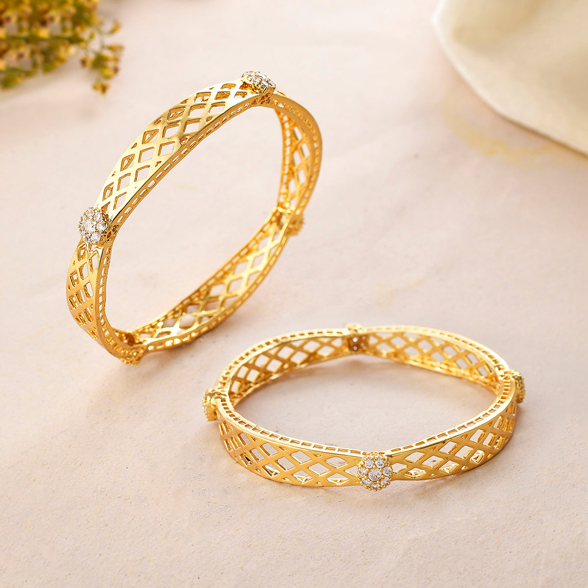 Women's Sparkling Elegance Diamond Shaped Cutwork Gold Plated Bangles - Voylla