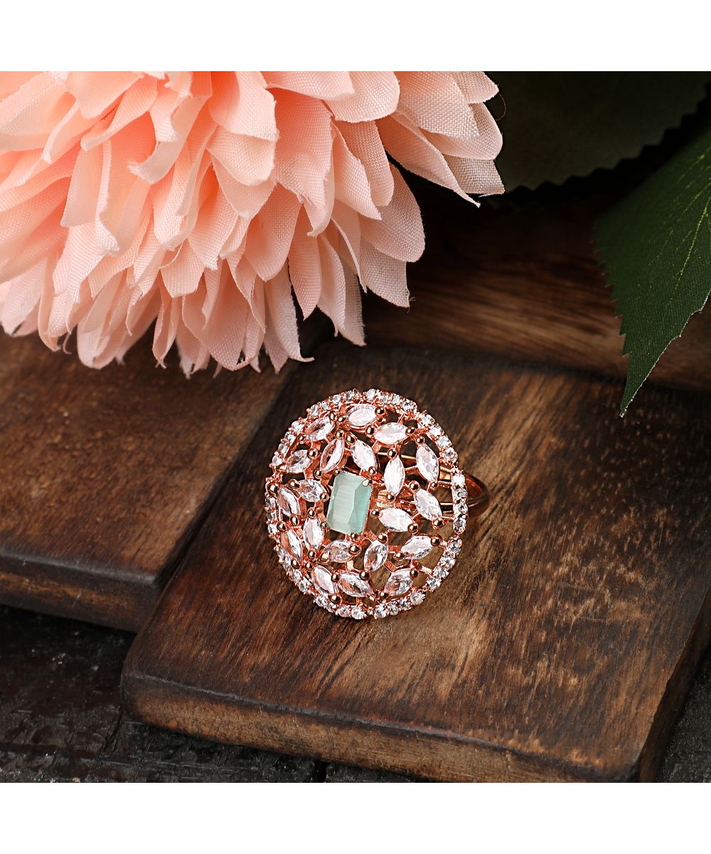 Women's Rose Gold plated American Diamond Studded Floral shaped with Blue colored Ring - MODE MANIA