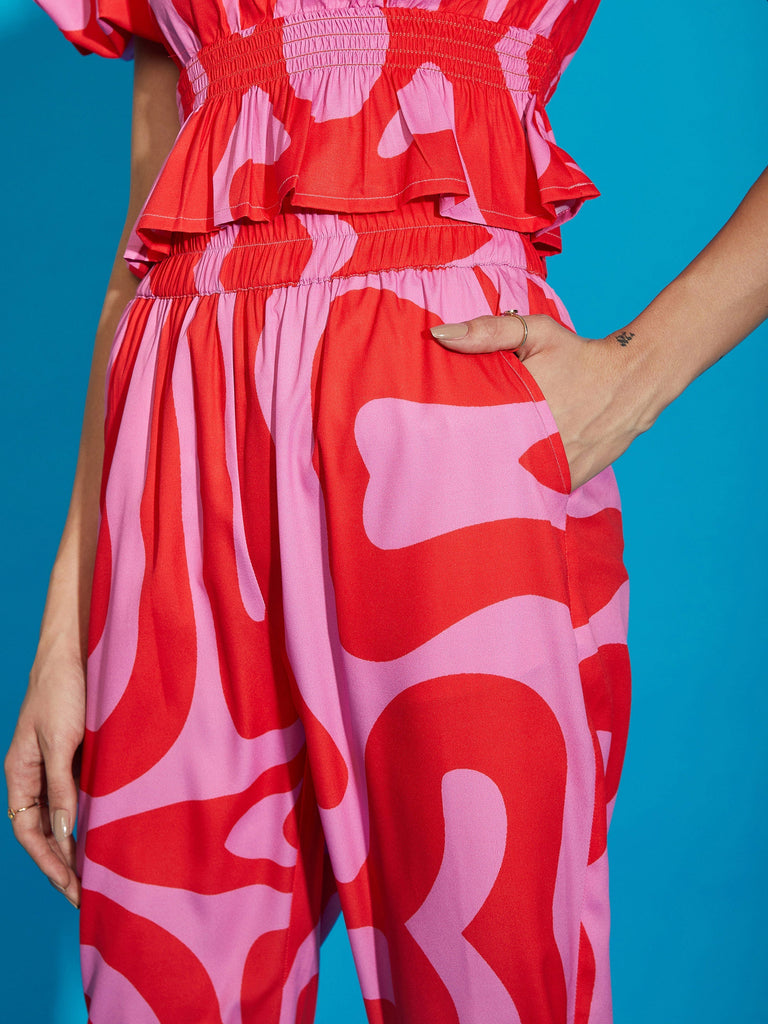 Women's Pink Abstract Print Peplum Top With Tapered Pants
