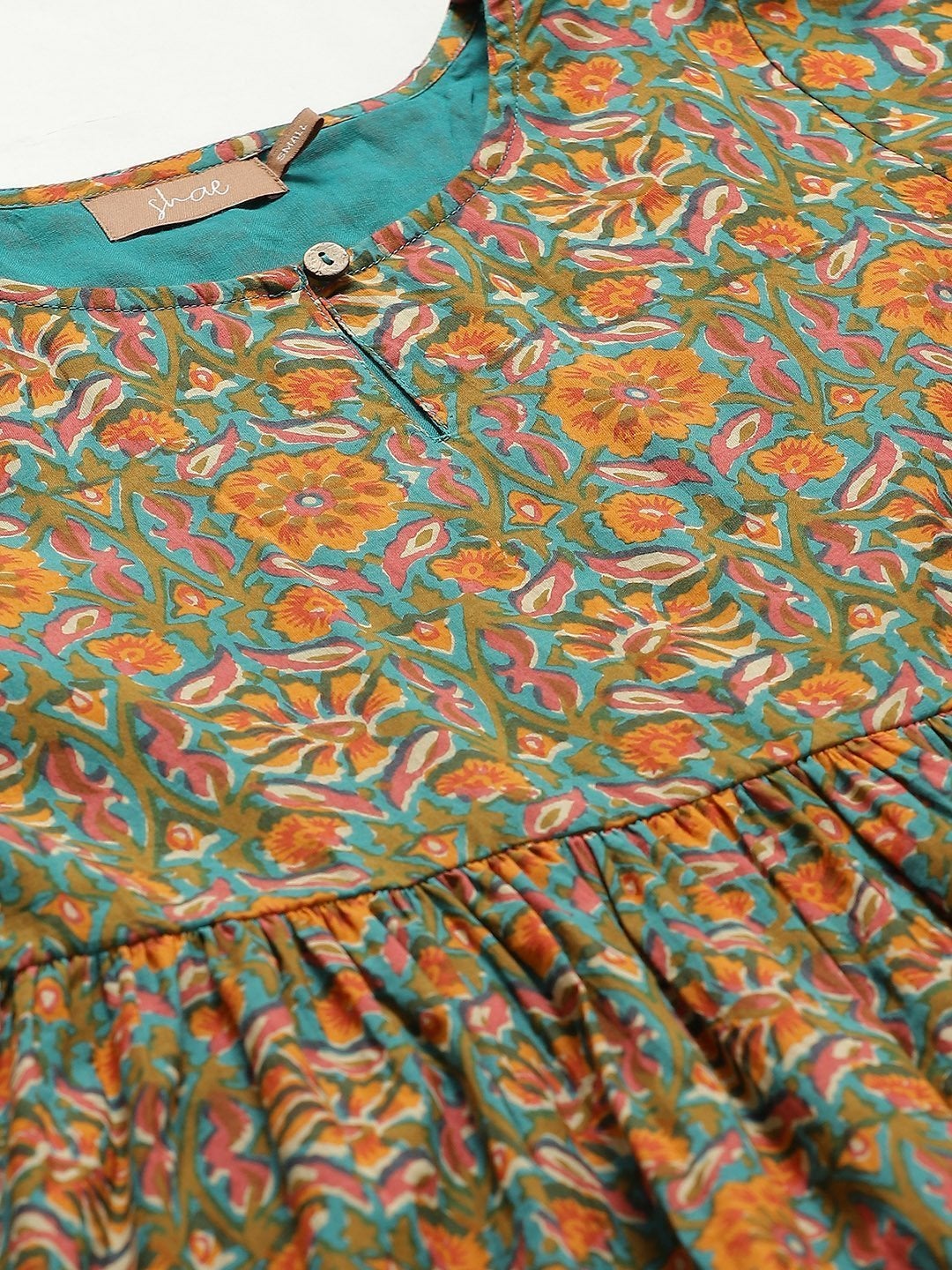 Women's Teal Floral Peplum Top With Tulip Pants